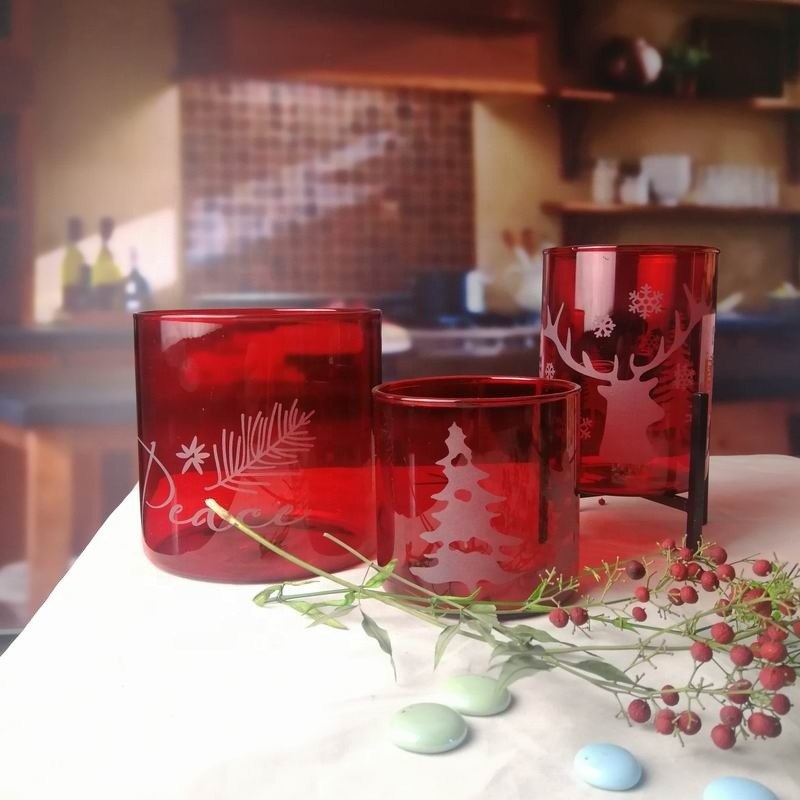 คุณภาพ Brosilicate Glass Candle Holders With Etched Christmas Pattern โรงงาน